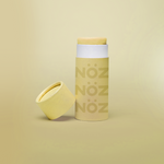 Load image into Gallery viewer, Front view of yellow Noz sunscreen with lid off
